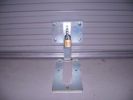 Roller door clamp